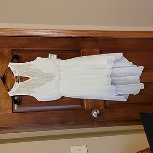 White high-low dress with silver and gold bling